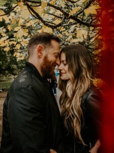 couple kissing with beard