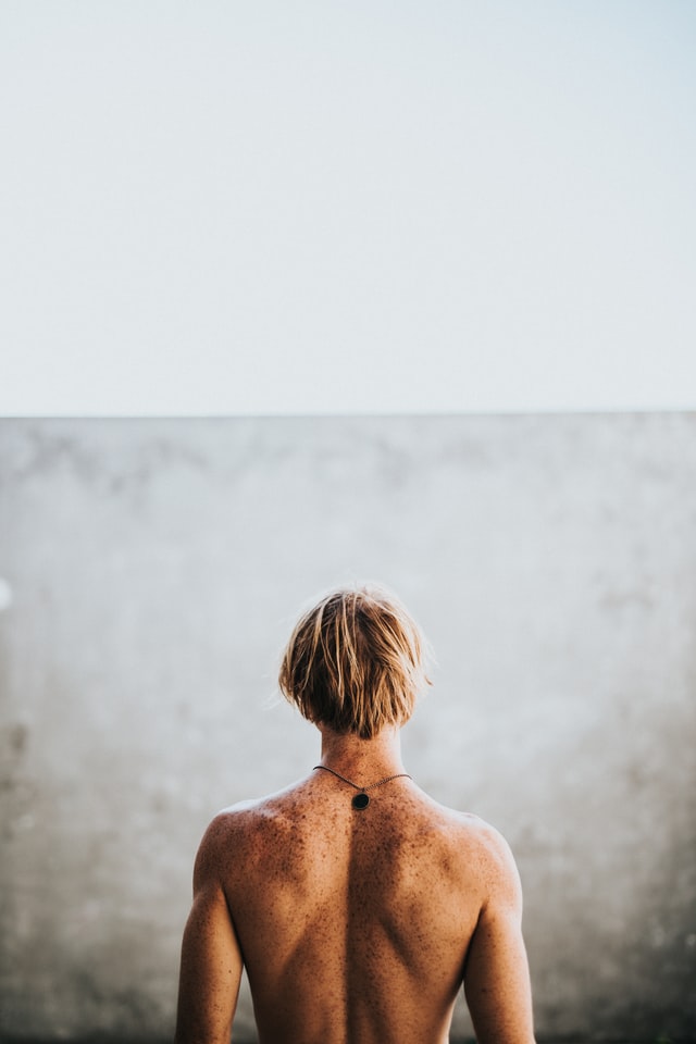 man's shaved back