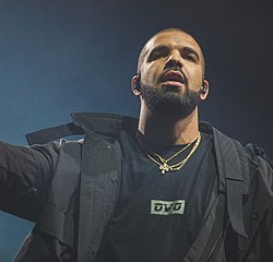 Drake rapping at show