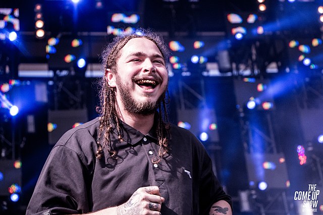 Post Malone rapping with a beard
