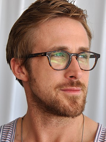 Ryan Gosling with glasses and a beard