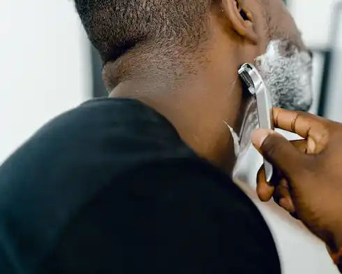 black man shaving neckline