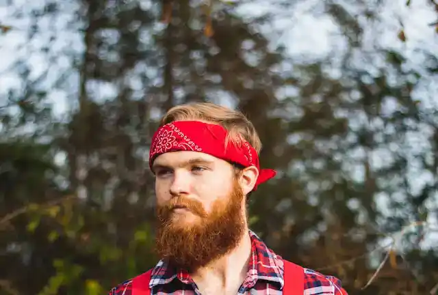 man with a low beard neckline