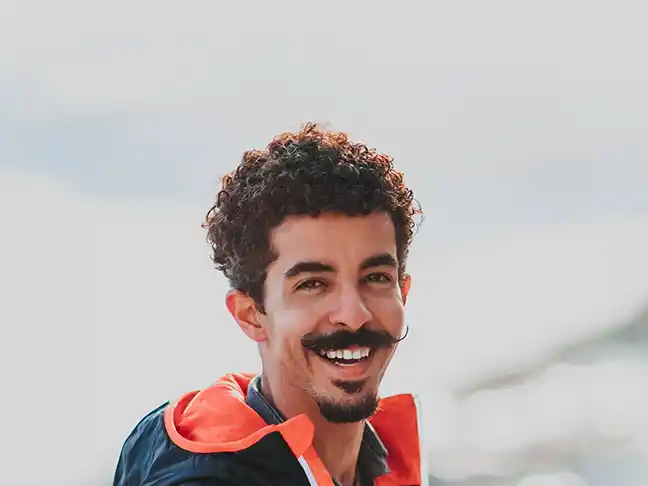 man smiling with soul patch beard with mustache and goatee